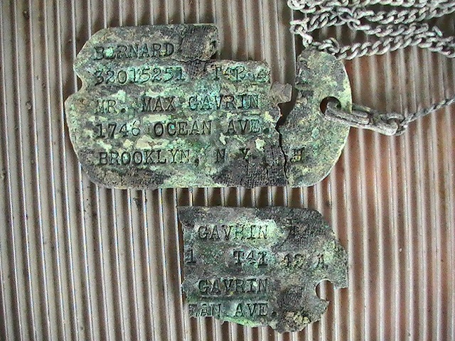 A pair of dog tags of Bernard Gavrin, who died on July 7th 1944.